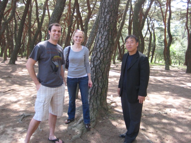 Seth, Anna and Mr. Che in the forest surrounding the tombs