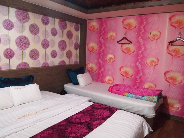 Our pink and purple flowered room